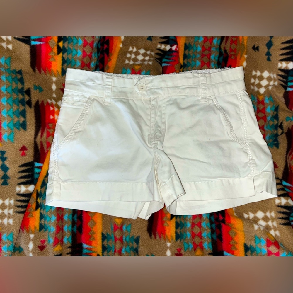 Size 9 white Free Style Revolution shorts. NEVER WORN!